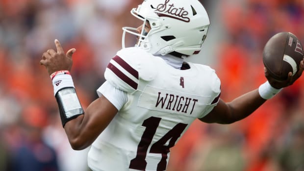 Mississippi State Bulldogs quarterback Mike Wright (14) throws the ball as Auburn Tigers take on Mississippi State Bulldogs at Jordan-Hare Stadium in Auburn, Ala., on Saturday, Oct. 28, 2023. Auburn Tigers lead Mississippi State Bulldogs 24-3 at halftime.